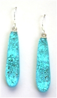 Ocean sparkle on opaque turquoise glass, sea sparkle