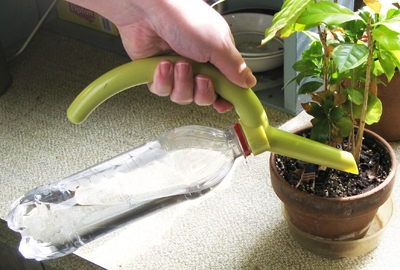 Portable Pourer Spout for water and soda bottles.