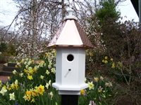 Our Cottage Bird House is lovely sitting on top of a post in your garden. The copper roof adds to the beauty. Will patina over time