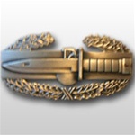 US Army Oxidized Regular Size Breast Badge: Combat Action - 1st Award