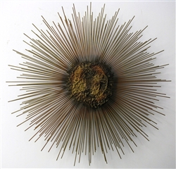 Vintage metal sculpture sunburst