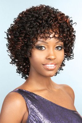 Synthetic Medium Wig by Beshe.  Page with tight spiral curls.  Overall length: 12"   Longer lasting beauty with quality materials.  Everlast Curls &trade;, keeps perfect shape longer.  Cool comfortable designs for all day wearing.   <a class=colo
