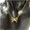 GOLD BOW TIE NECKLACE