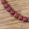 Photo of 6mm Red Jasper beads - matte finish - 15" strands