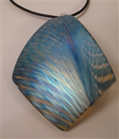 Kim Lotton Art Glass Pendant
Glass was hand blown by David Lotton
Pendant cut and polished with silver catch added by
Kim Lotton.  signed KL
Each Pendant is One of a Kind.
Each is shipped with a leather neck band.
Size of glass 3 by2.25