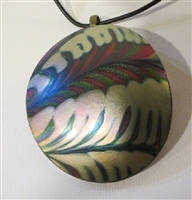 Kim Lotton Art Glass Pendant
Glass was hand blown by Daniel Lotton
Pendant cut and polished with silver catch added by
Kim Lotton.
Each Pendant is One of a Kind.
Each is shipped with a leather neck band.
Size of glass 2.5 by 2