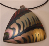 Kim Lotton Art Glass Pendant
Glass was hand blown by Daniel Lotton
Pendant cut and polished with silver catch added by
Kim Lotton.
Each Pendant is One of a Kind.
Each is shipped with a leather neck band.
Size of glass 2.5 by 2