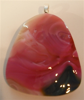 Kim Lotton Art Glass Pendant
Glass was hand blown by Charles Lotton
Pendant cut and polished with silver catch added by
Kim Lotton.
Each Pendant is One of a Kind.
Each is shipped with a leather neck band.
Size of glass 2 by1.5