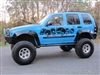 Blue Jeep Liberty w/ Black Skull Pile Side Graphic