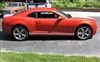 Orange Camaro w/ white plain rocker stripes