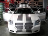 Black Dodge Magnum w/ Gold 10" Rally Stripes