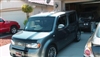 Silver Nissan Cube w/ Offset Rally Stripes