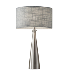 Linda Modern Table Lamp. A smooth, tapered base with a brushed steel finish beautifully reflects the light shining through a light grey textured fabric shade .