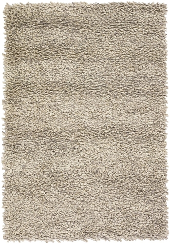 The Betul rug is hand woven in a subtle linear design, giving a contemporary flair to any room.