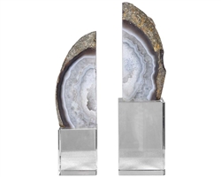 Amiya Modern Bookends Set of 2 Set of two bookends feature thick, gray marble with raw unfinished edges set atop clear crystal cube bases.