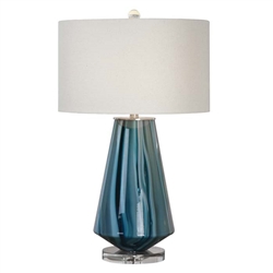 Pescara Modern Lamp. Teal-gray glass base featuring swirls of bold blue-ivory accented with brushed nickel details and a thick crystal foot. The round hardback drum shade is an ivory linen fabric.