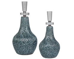 Almera Bottles Set of 2. Set of two ceramic bottles feature an organic textured finish in a distressed dark teal glaze, paired with polished nickel accents and thick crystal details.