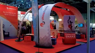 Custom trade show exhibit structures, like design # 561411 stand out on the convention floor. Draw eyes to your trade show booth with exciting custom exhibits & displays. We can customize any trade show exhibit or display to your specifications.