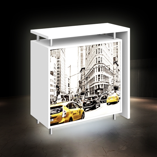Hybrid Pro Modular Counter 01 is a stylish counter solution for any exhibit, featuring accessible storage with locking doors, choice of opaque or backlit push-fit fabric graphics and top laminated accent panel cover.