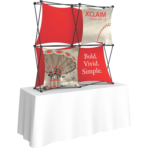 5ft Xclaim 3-D PopUp Table Top Display Kit 01 with Full Fabric Graphics. Portable tabletop displays and exhibits. Several different styles are available, including pop up frames with stretch fabric or fold up panels with custom graphics.