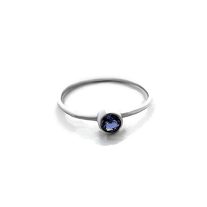 Sterling silver stacking ring with round faceted gemstone, shown in Iolite.
