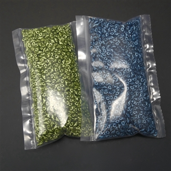 Two 50 gram packs of Czech super8 beads, one pack petrol pastel, one pack olivine pastel.