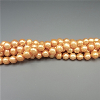 5mm round peachy-orange fresh water pearls, one 16" strand