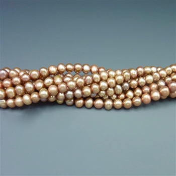 4.5mm round dark champagne fresh water pearls, one 16" strand