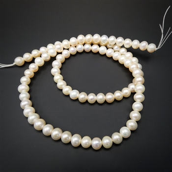 5-5.5mm natural ivory round fresh water pearls, one 15 inch strand
