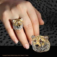 Cheetah head ring "Swift" by wildlife jeweler and artist Daniel C. Toledo of Toledo Wildlife Works of Art features rhodium and 22k gold plated over sterling silver, black enamel, citrine eyes.  Limited edition of 250