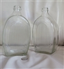 Hand blown clear glass bottles with ribbed side