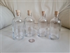Set of 4 glass storage display glass bottles