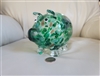 Cute art glass pig green speckled pattern