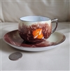 Elegant vintage hand painted porcelain teacup