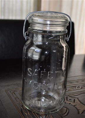 Glass jar with lid and wire bail