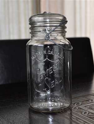 wide mouth glass jar with lid and wire bail