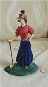 Cast iron woman golfer door stop decor