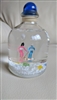 Snow globe glass bottle winter skiing theme