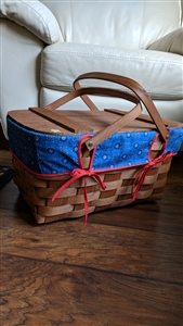 Woven picnic basket with lid and handles