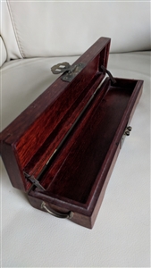 Dark cherry colored wood elegant box with brass