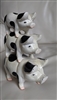 Set of cast iron 3 stack on pigs doorstop bookend