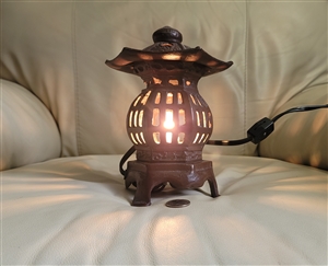 Cast iron Pagoda shaped electric lamp display