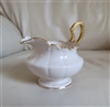 Elegant pedestal Lenox creamer gold accents