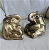 Large weathered brass elephants bookends