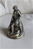 Forged metal bell with Renaissance men figure