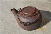 Vintage cast iron kettle with lid