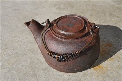 Vintage cast iron kettle with lid
