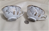 NAPCO porcelain set of two teacups gold embossed