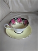 Rose medallions on yellow Paragon teacup saucer