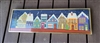 Colorful needlepoint Holidays architecture display